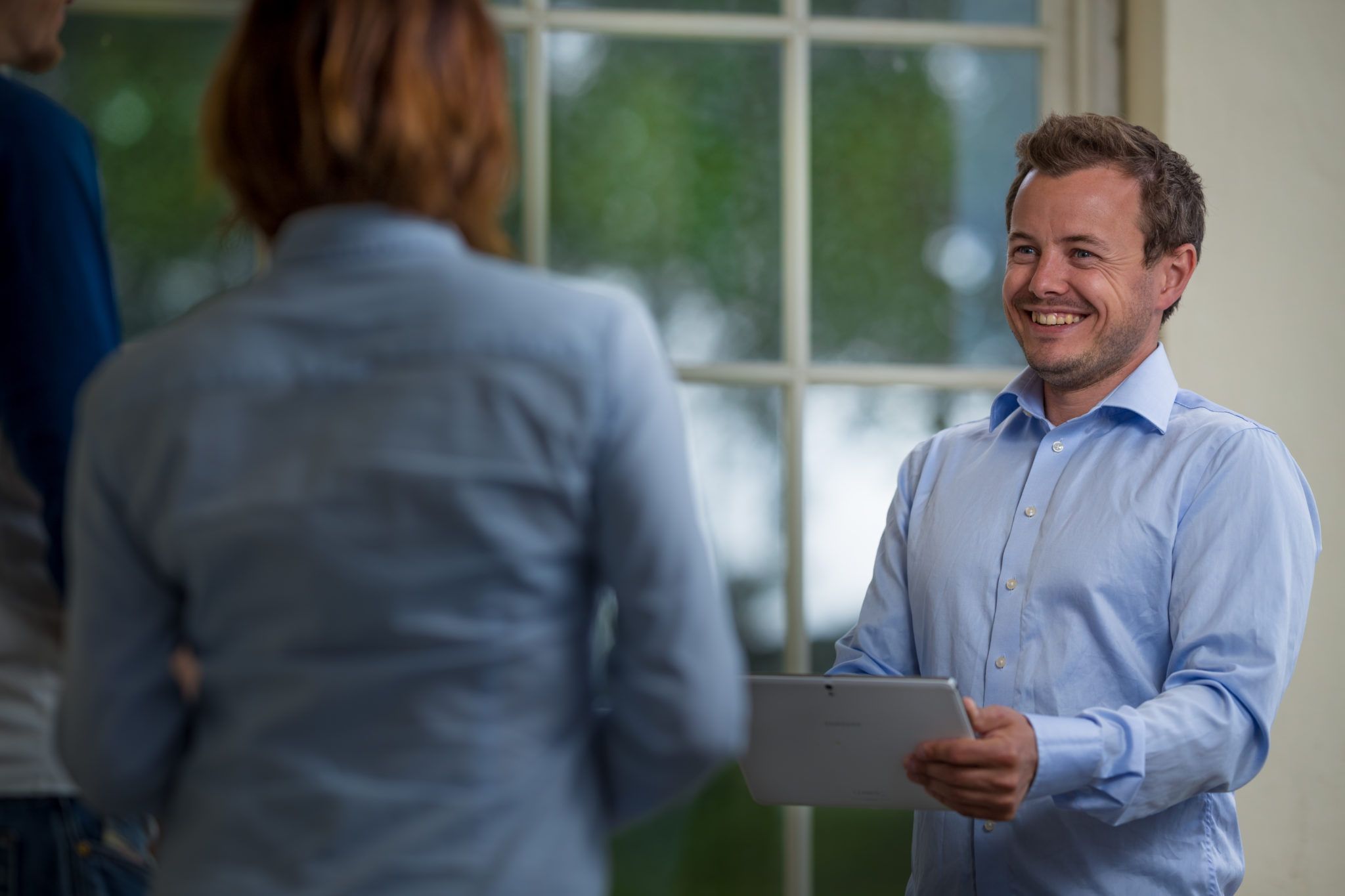 Ansatte i Miljøfyrtårn samtaler